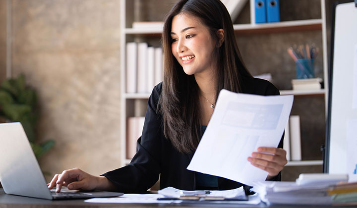 woman banking on laptop